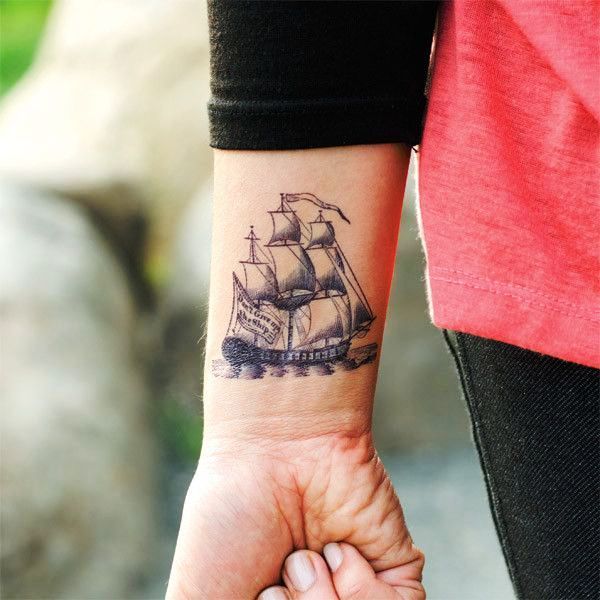 Adorable Boat Tattoo On Wrist