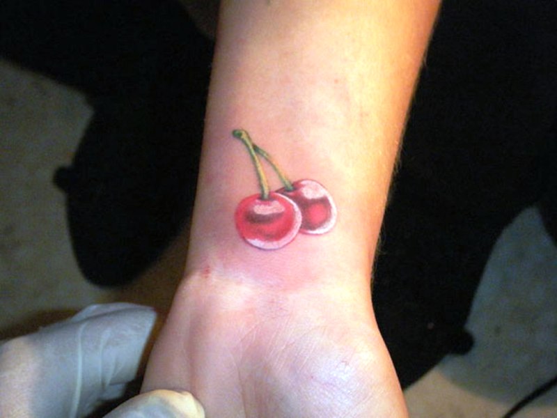 Adorable Cherry Tattoo On Wrist