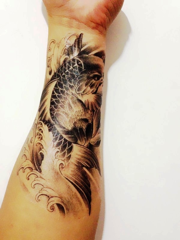 Adorable Fish Tattoo On Wrist