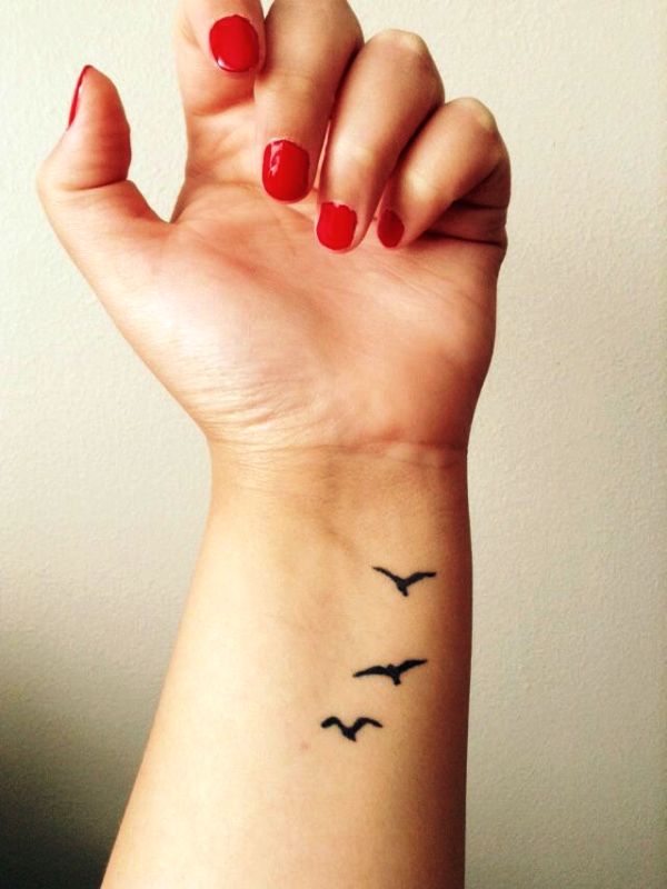 Adorable Flying Birds Tattoo Design