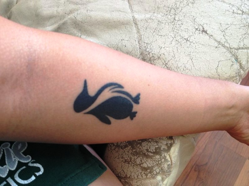 Adorable Penguin Wrist Tattoo