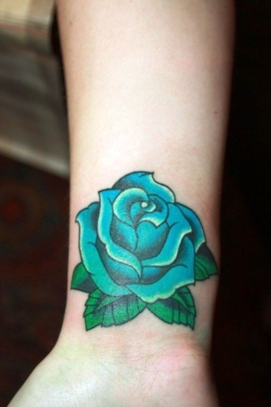 Adorable Rose Tattoo On Wrist