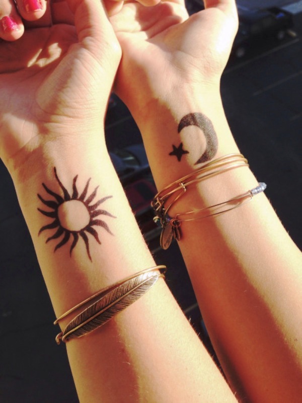 Adorable Sun Tattoo On Wrist