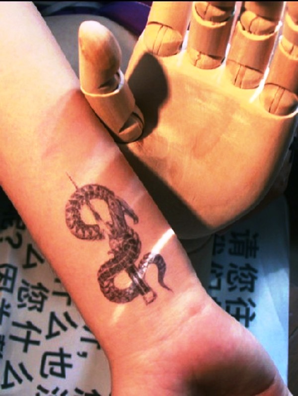 Adorable Wrist Snake Tattoo