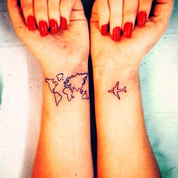 Aeroplane And Map Tattoo On Wrist