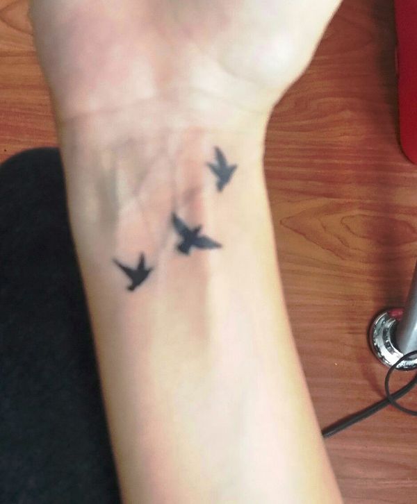 Amazing Birds Tattoo On Wrist