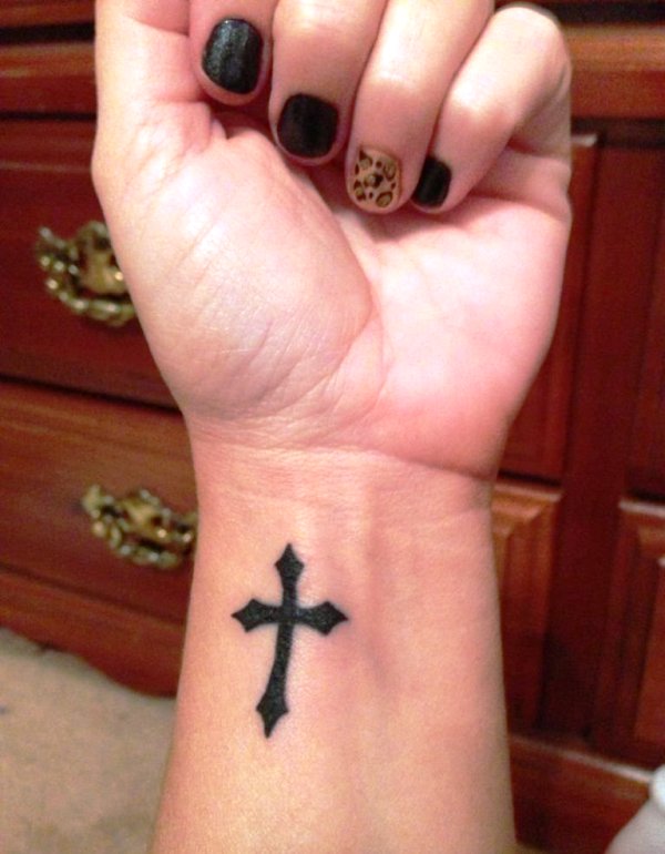 Amazing Black Cross Tattoo On Wrist
