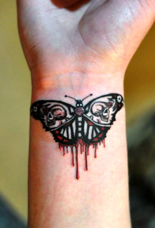 25 Adorable Butterfly Tattoos For Wrist,Small Salon Design Ideas