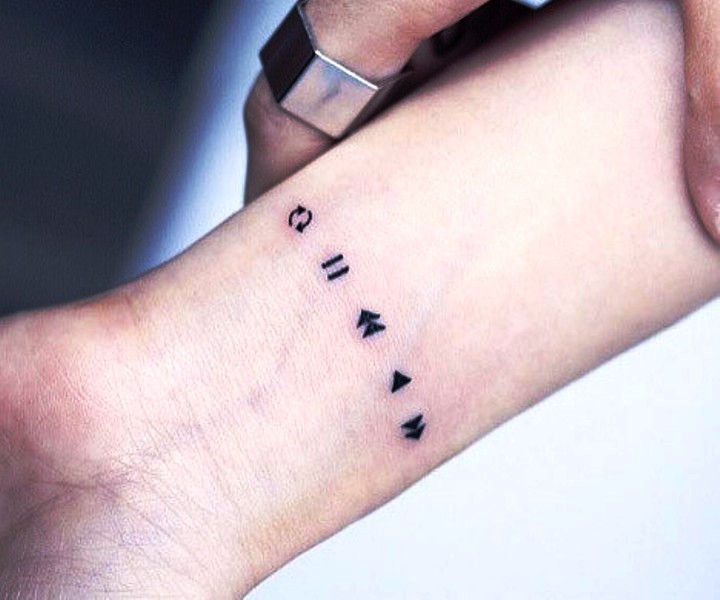 Amazing Control Buttons Tattoo On Wrist