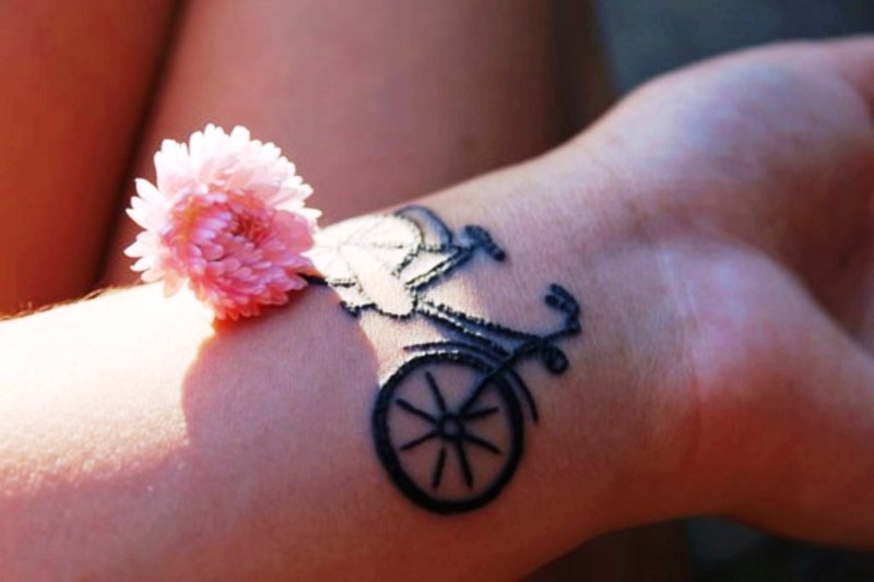 Amazing Cycle Tattoo On Wrist