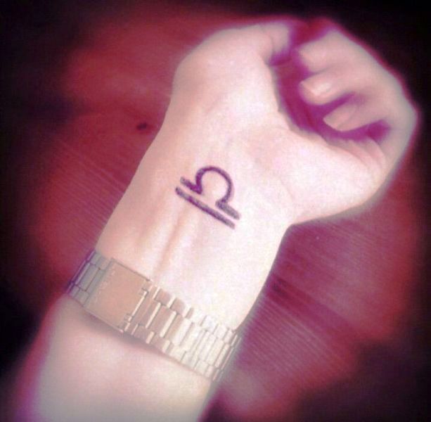 Amazing Libra Tattoo On Wrist
