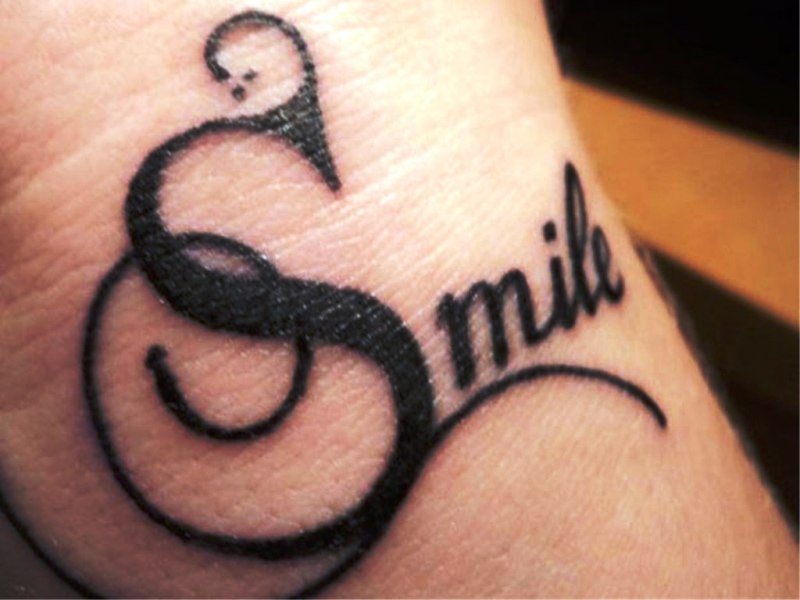 Amazing Smile Wrist Tattoo