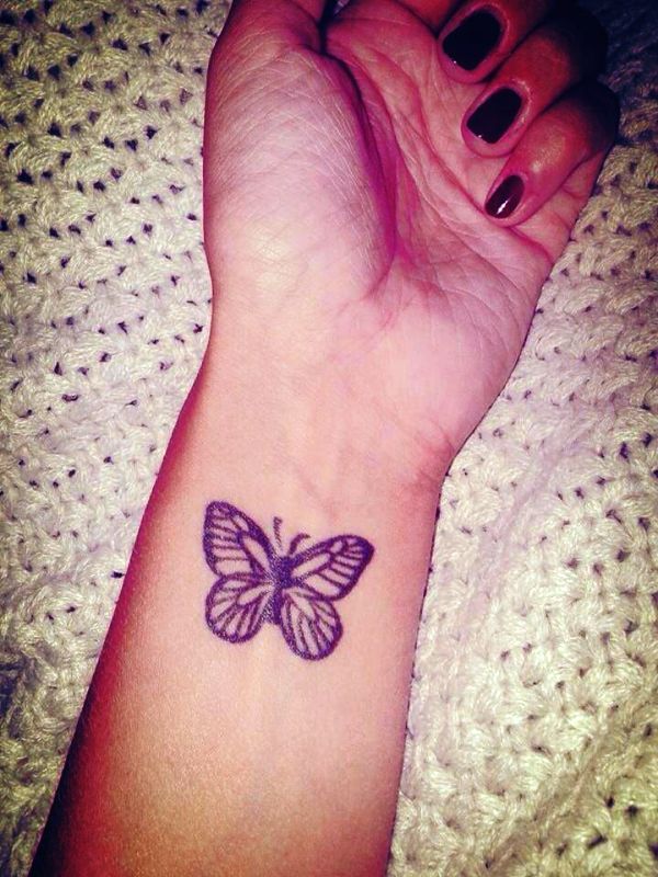 Amazing Tribal Butterfly Tattoo On Wrist