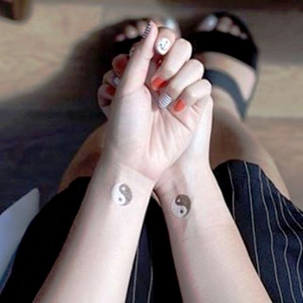 Amazing Yin Yang Tattoo On Wrist