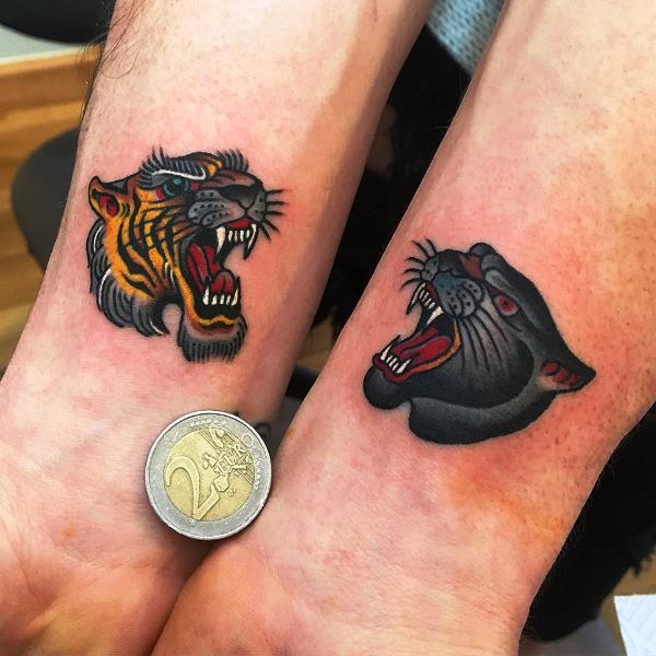 Angry Colorful Tigers Tattoo On Wrist