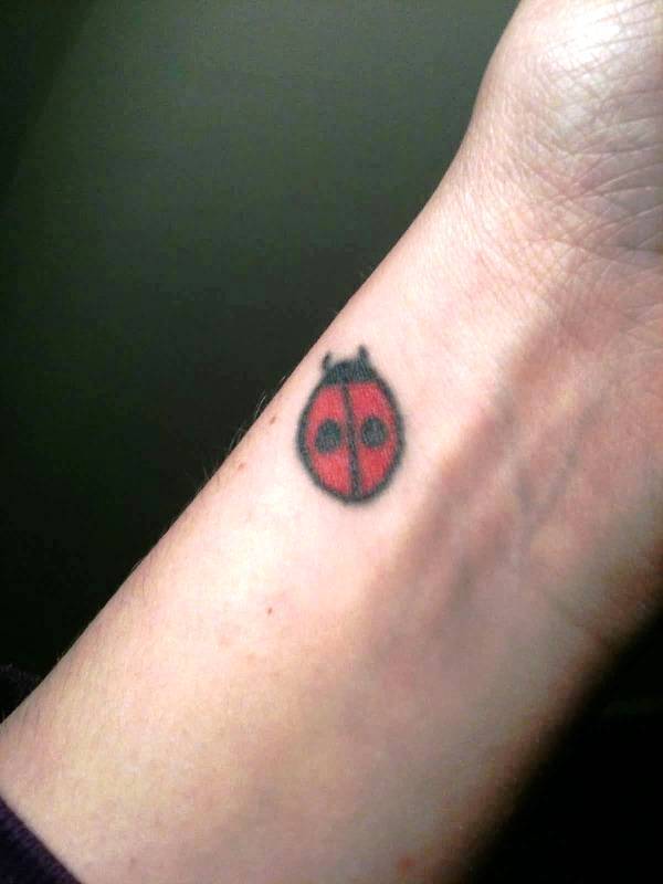 Attractive Ladybug Tattoo On Wrist