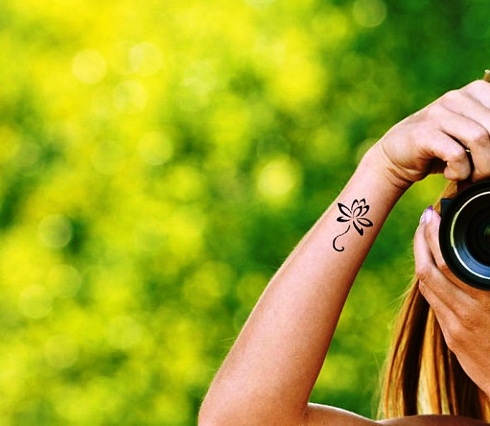 Attractive Lotus Tattoo On Wrist