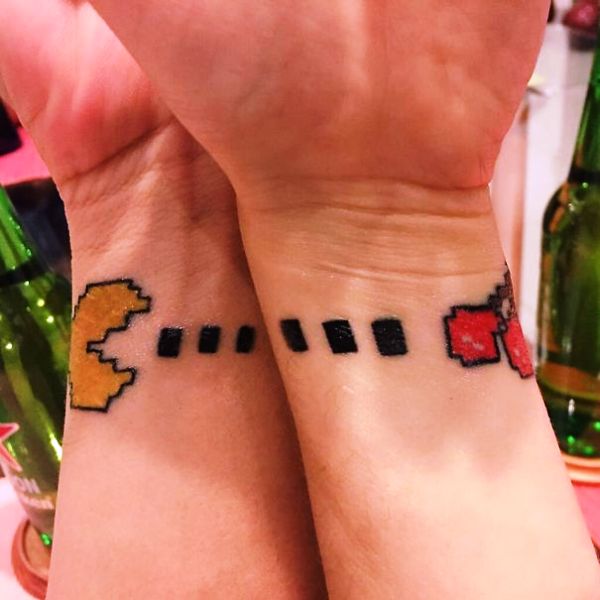 Attractive Pacman Wrist Tattoo