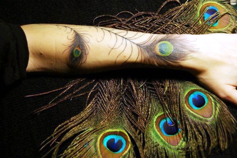 Attractive Peacock Feather Wrist Tattoo