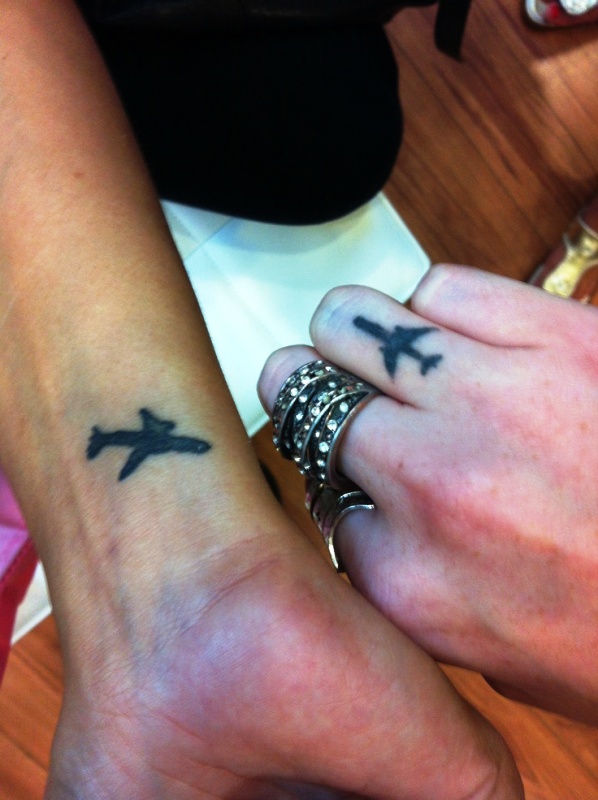 Attractive Plane Tattoo On Wrist