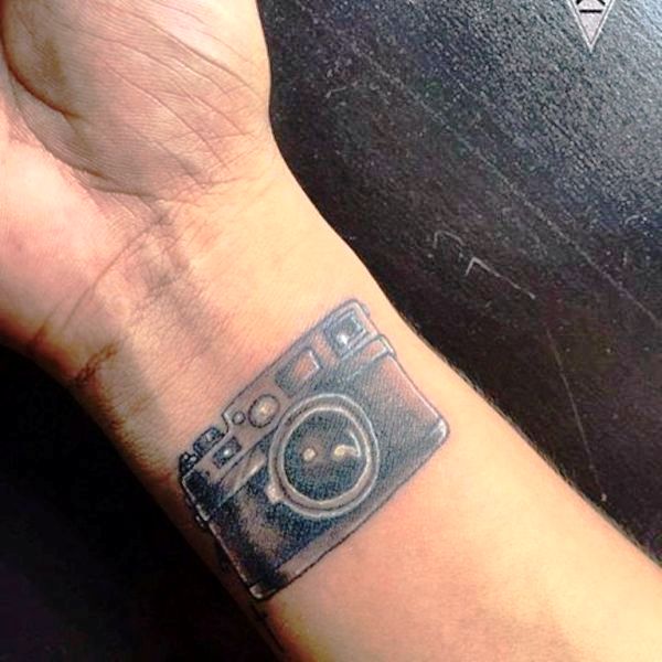 Beautiful Camera Tattoo On Wrist