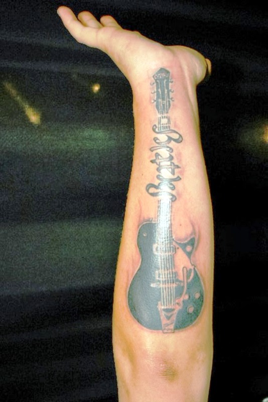 Beautiful Guitar Wrist Tattoo