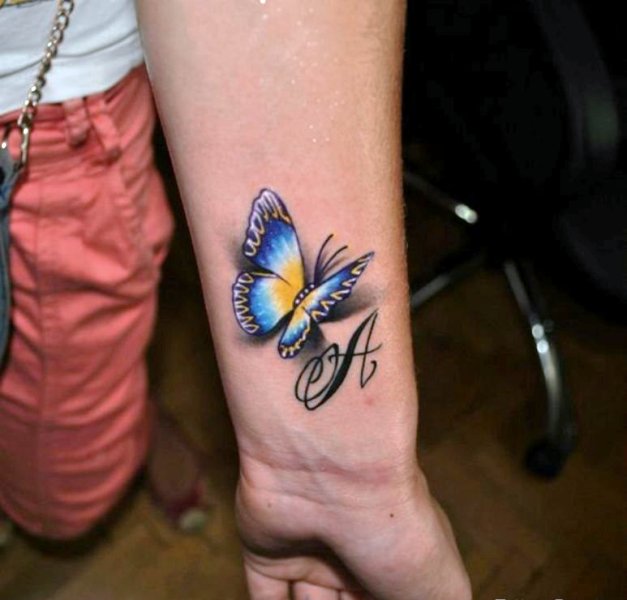 Beautiful Realistic Butterfly Tattoo On Wrist
