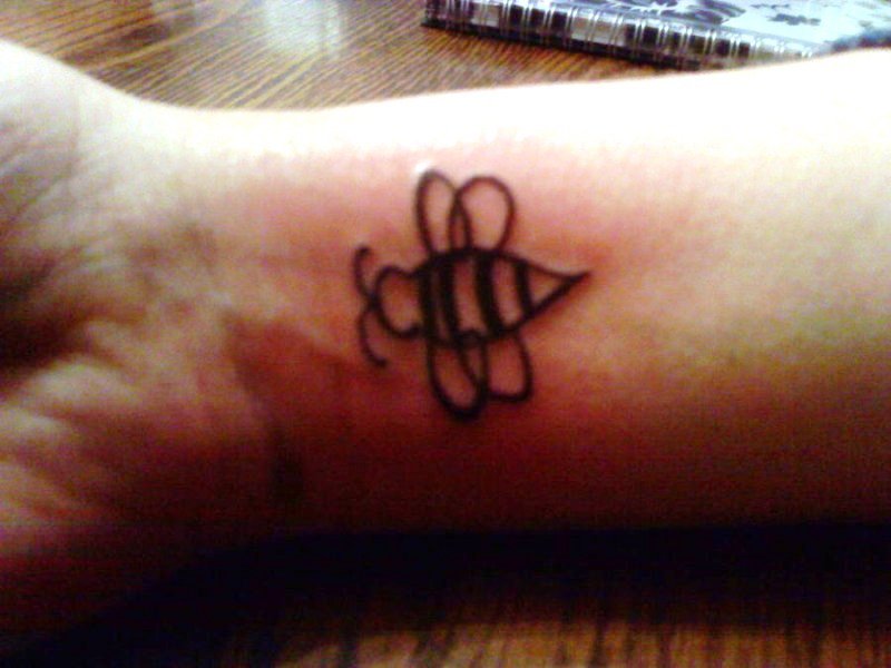Bee Outline Tattoo On Wrist
