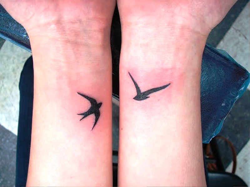 Birds Tattoo On Both Wrists