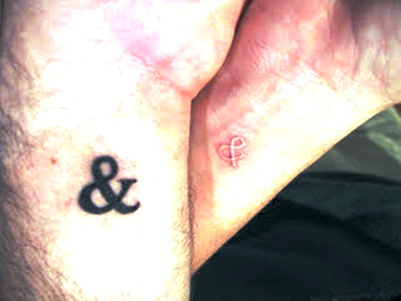 Colored Ampersand Tattoo On Wrist