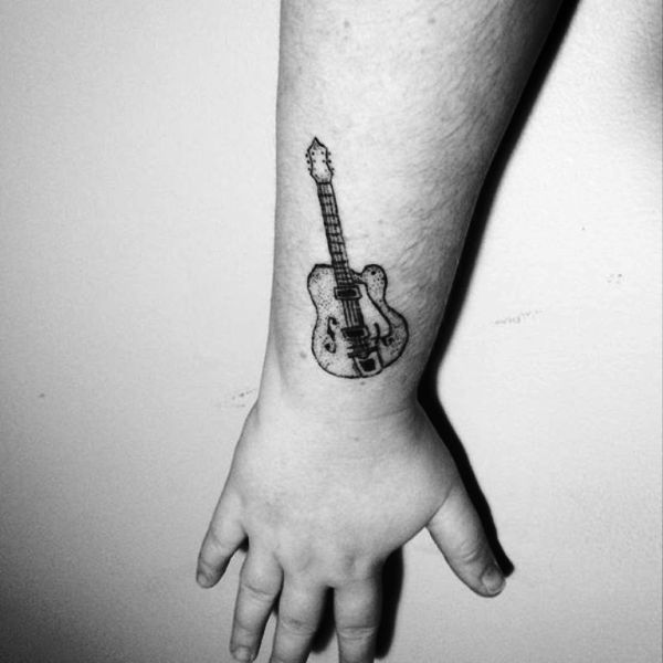 Black And White Guitar Wrist Tattoo