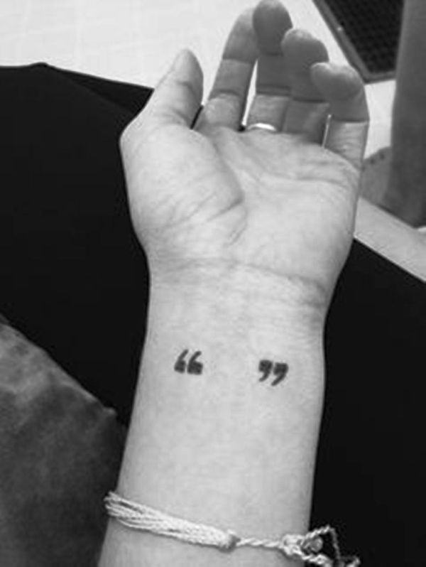 Black And White Quotation Tattoo On Wrist