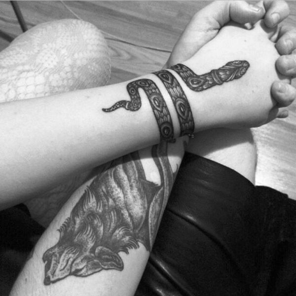 Black And White Snake Wrist Tattoo