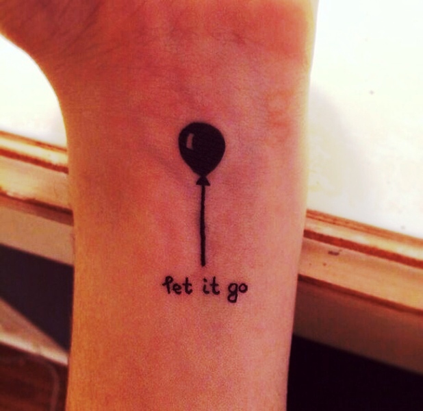 Black Balloon Tattoo On Wrist