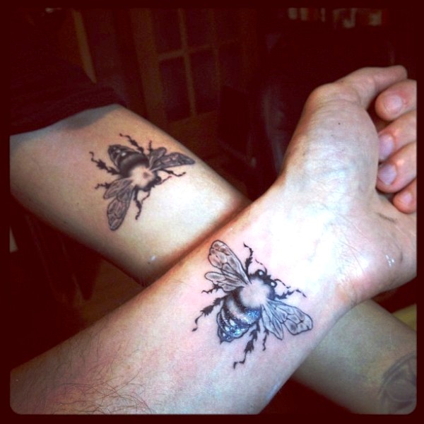 Black Bee Tattoo On Wrist And Arm