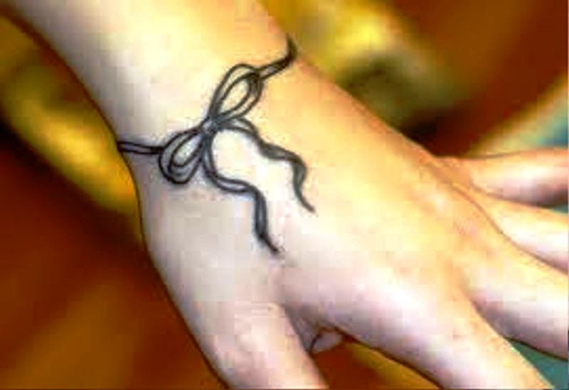 Black Bow Band Tattoo On Wrist
