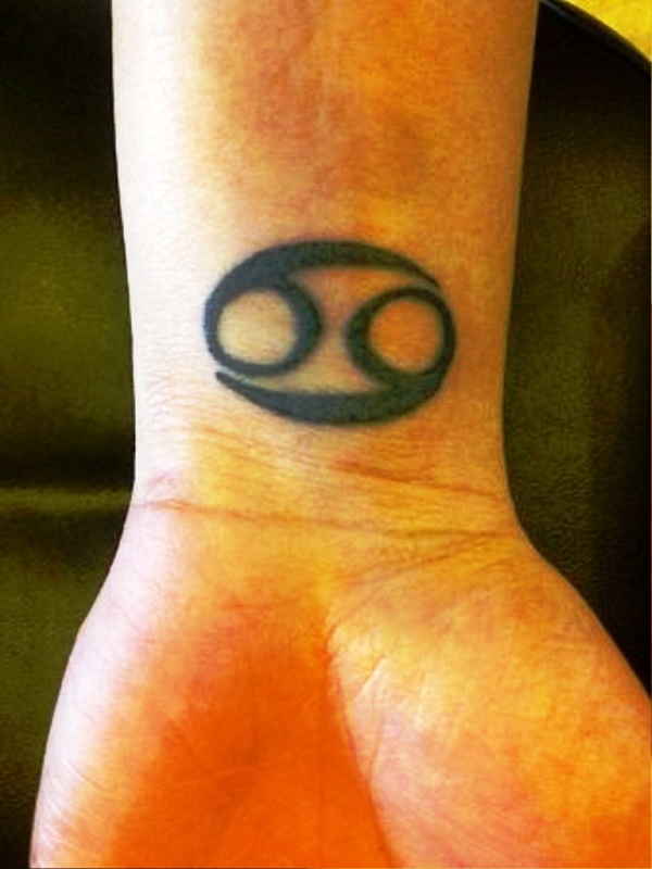 Black Cancer Zodiac Wrist Tattoo