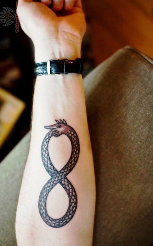 Black Large Tattoo On Wrist