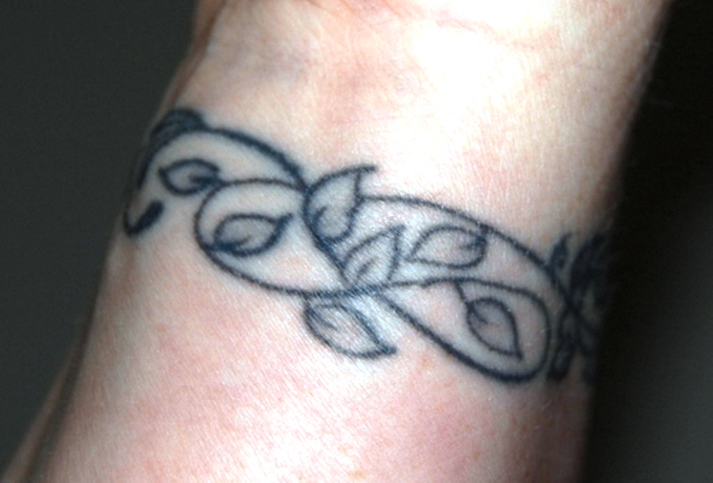 Black Vine Tattoo On Wrist
