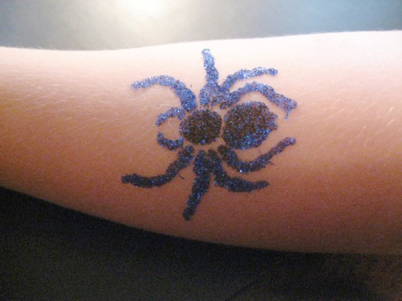 Blue Black Spider Wrist Tattoo