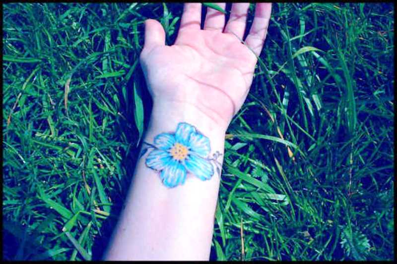 Blue Hibiscus Wrist Tattoo