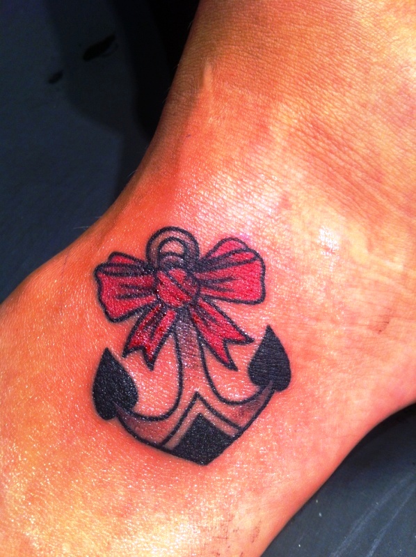 Bow And Anchor Tattoo On Wrist