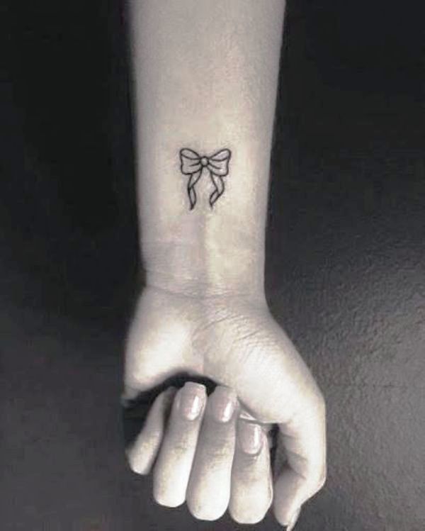 Bow Tattoo On Wrist Image