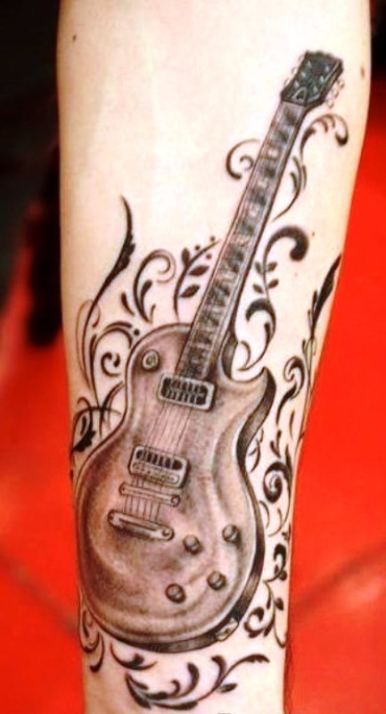 Brown Guitar Tattoo On Wrist
