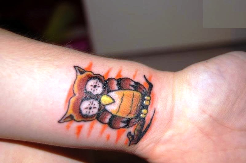 Brown Owl Tattoo On Wrist