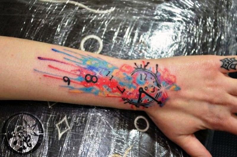 Colored Clock Tattoo On Wrist