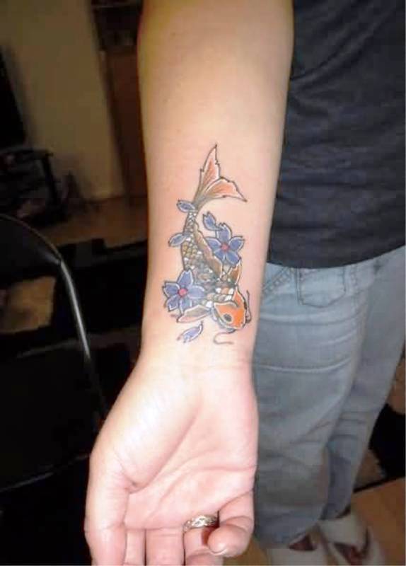 Colored Fish Tattoo On Wrist