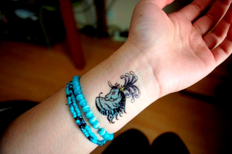 Colored Horse Tattoo On Wrist
