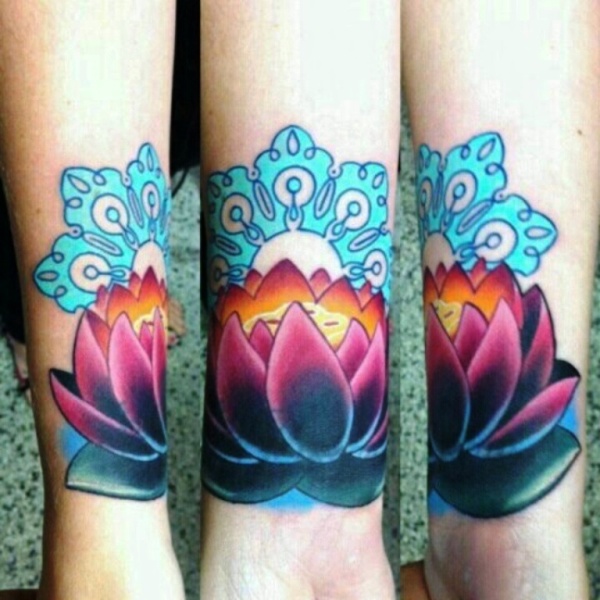 Colored Lotus Tattoo On Wrist