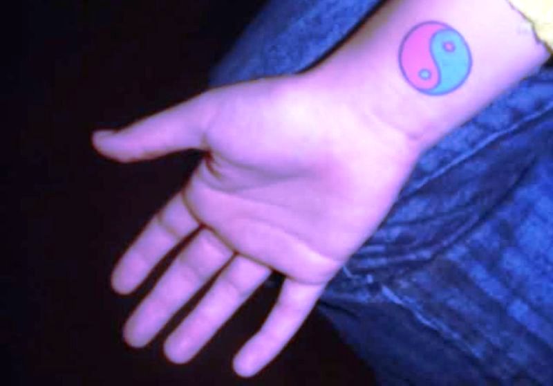 Colorful Yin Yang Tattoo On Wrist